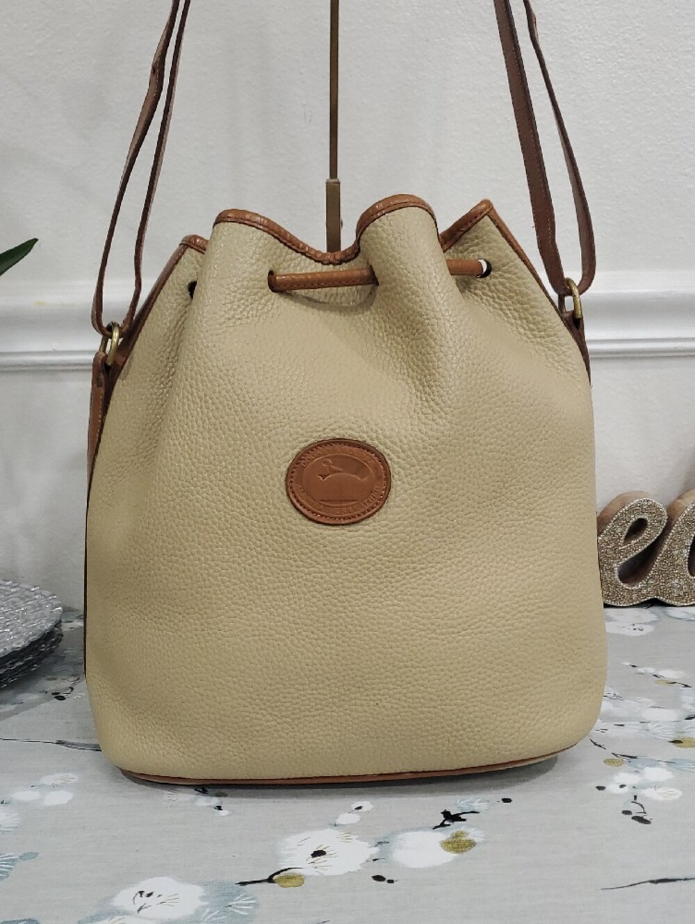 Dooney & Bourke Beige Leather Drawstring Bucket/Shoulder Bag with Brown Trim